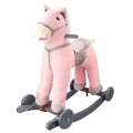 ADAM TOYS KONIK RÓŻOWY NA BIEGUNACH Z KOŁAMI WYDAJE DŹWIĘKI