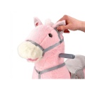 ADAM TOYS KONIK RÓŻOWY NA BIEGUNACH Z KOŁAMI WYDAJE DŹWIĘKI